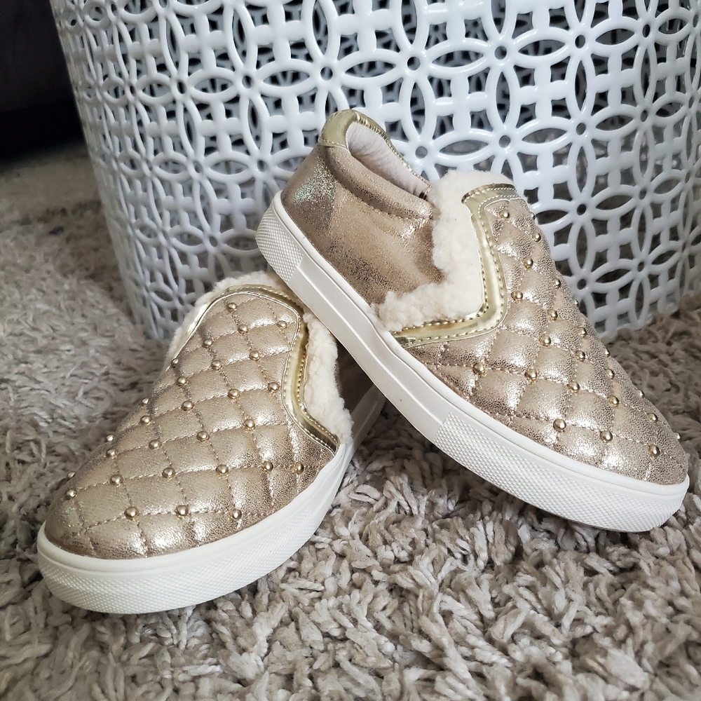Fuzzy gold slip ons